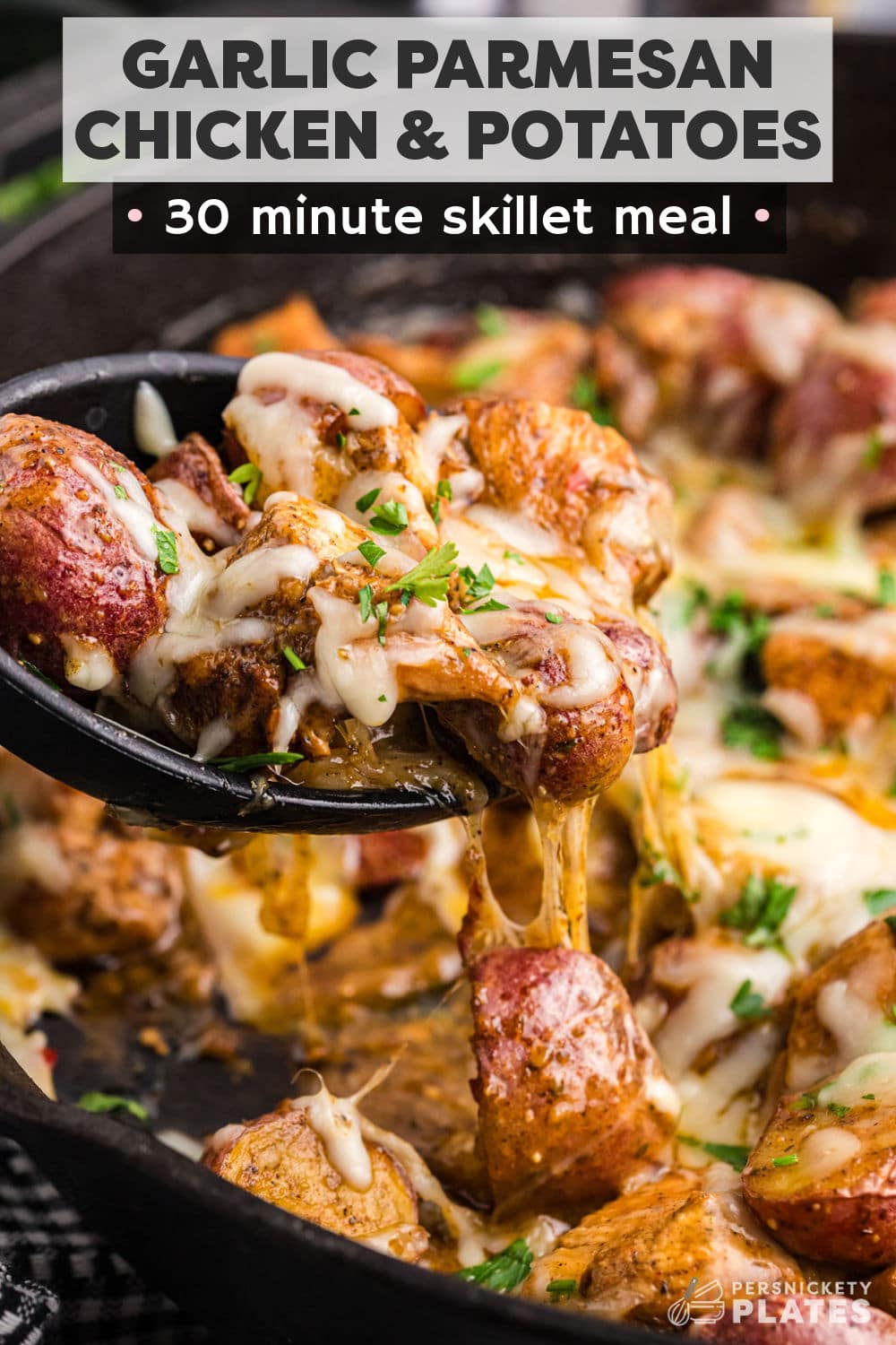 One skillet, one meal! This 35-minute garlic parmesan chicken and potatoes makes dinner a breeze. Chunks of seasoned chicken and tender potatoes, smothered in a creamy garlic parmesan wing sauce served with melted cheese on top!  All you need is a veggie side and dinner is served! | www.persnicketyplates.com