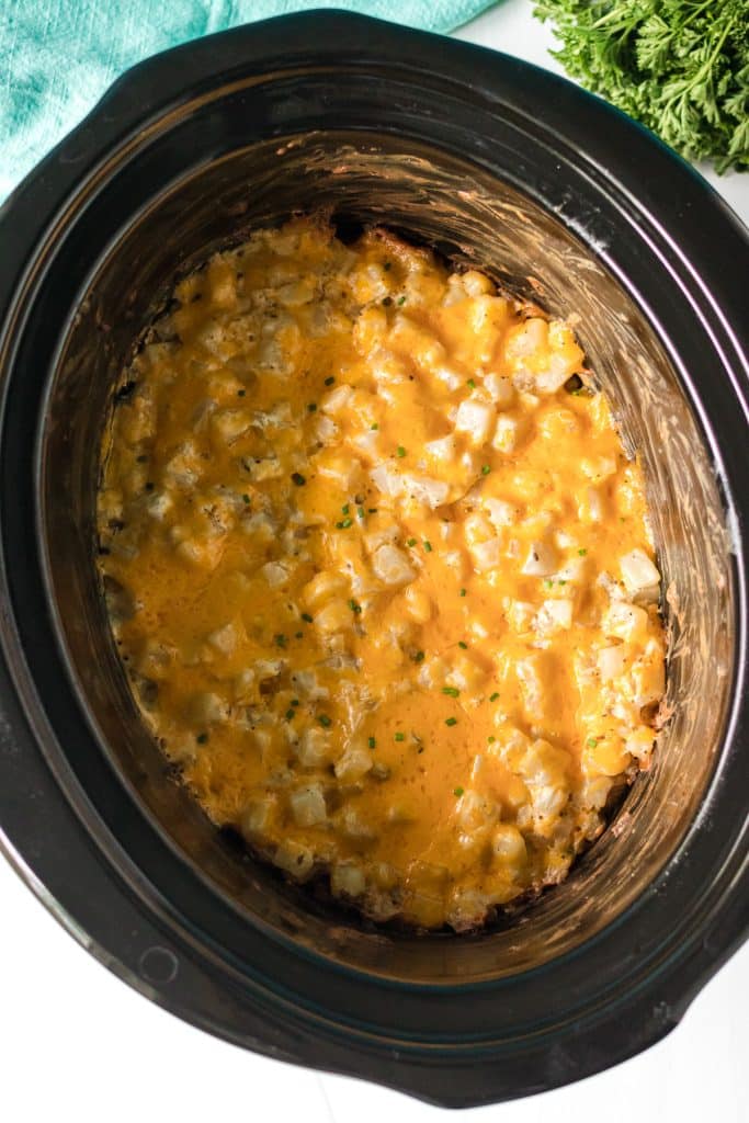 overhead shot of slow cooker cheesy potatoes.
