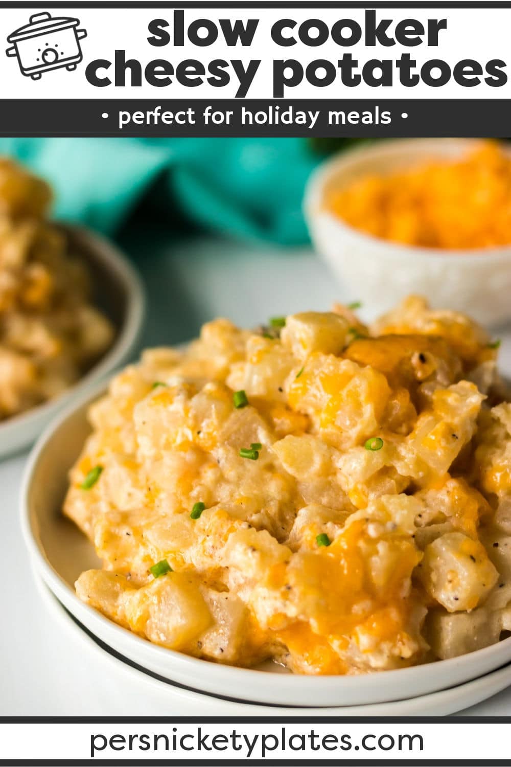 Slow Cooker Cheesy Potatoes is an incredibly simple side dish that is perfect for a holiday meal but it's easy enough to serve for a simple weeknight family dinner. | www.persnicketyplates.com