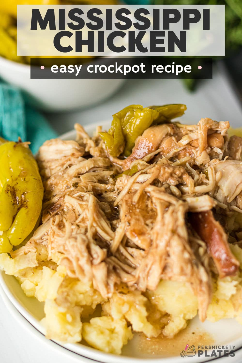 This recipe is the chicken version of the classic Mississippi pot roast. We're replacing chuck roast with chicken breasts for a lighter, yet just as flavorful twist! Slow cooker Mississippi chicken is made with au jus mix, ranch seasoning, butter, and those signature pepperoncini. Cooked low and slow until the flavors come together for pure comfort food! | www.persnicketyplates.com
