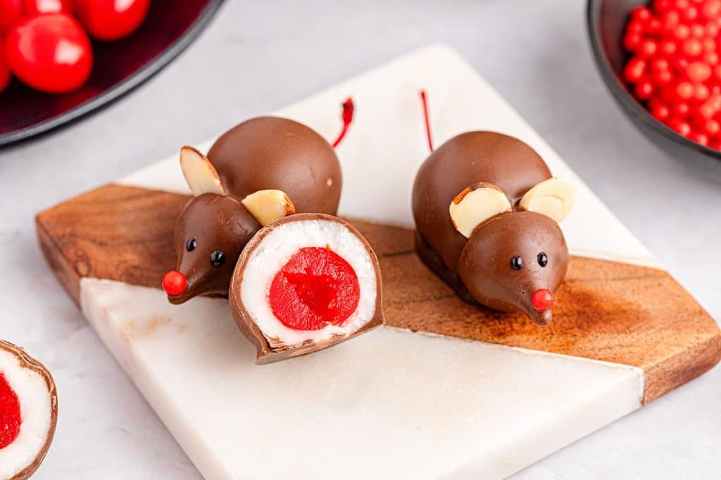 chocolate cherry mouse cut in half to show the cherry center.