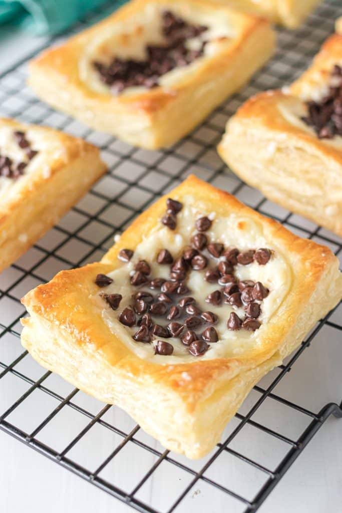 chocolate chip danish on a wire cooling rack.