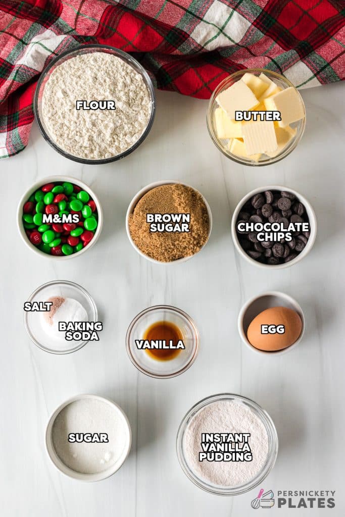 overhead shot of labeled ingredients laid out to make christmas chocolate chip cookies.