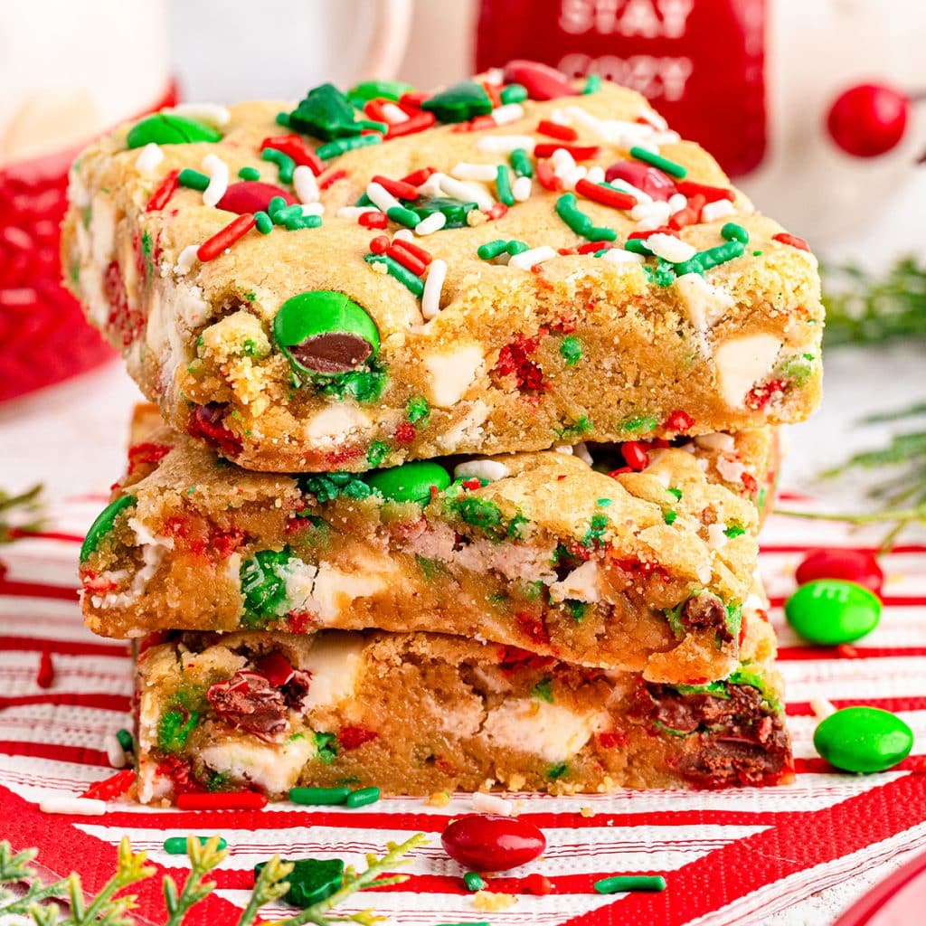 stack of 3 festive christmas cookie bars.