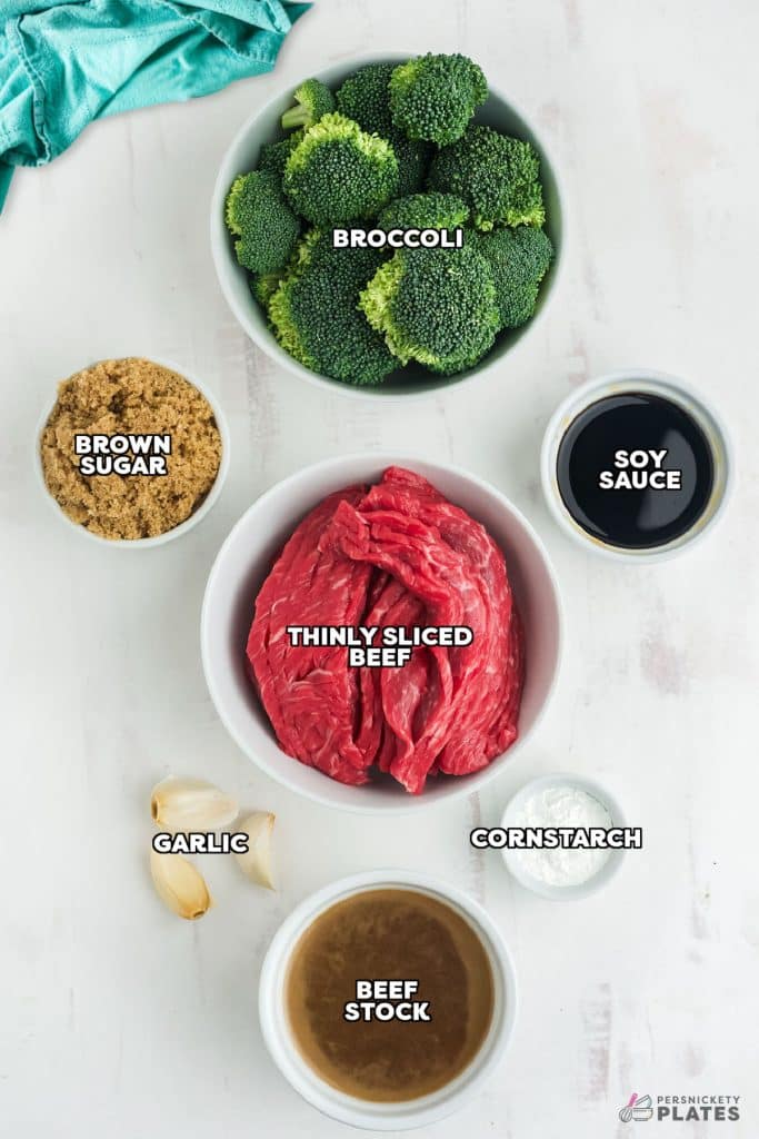 overhead shot of labeled ingredients laid out to make beef & broccoli.