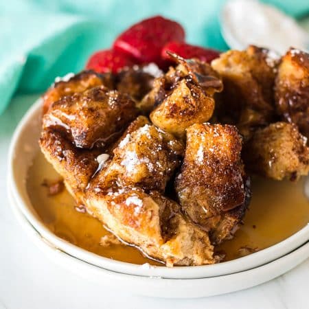 french toast casserole topped with syrup.