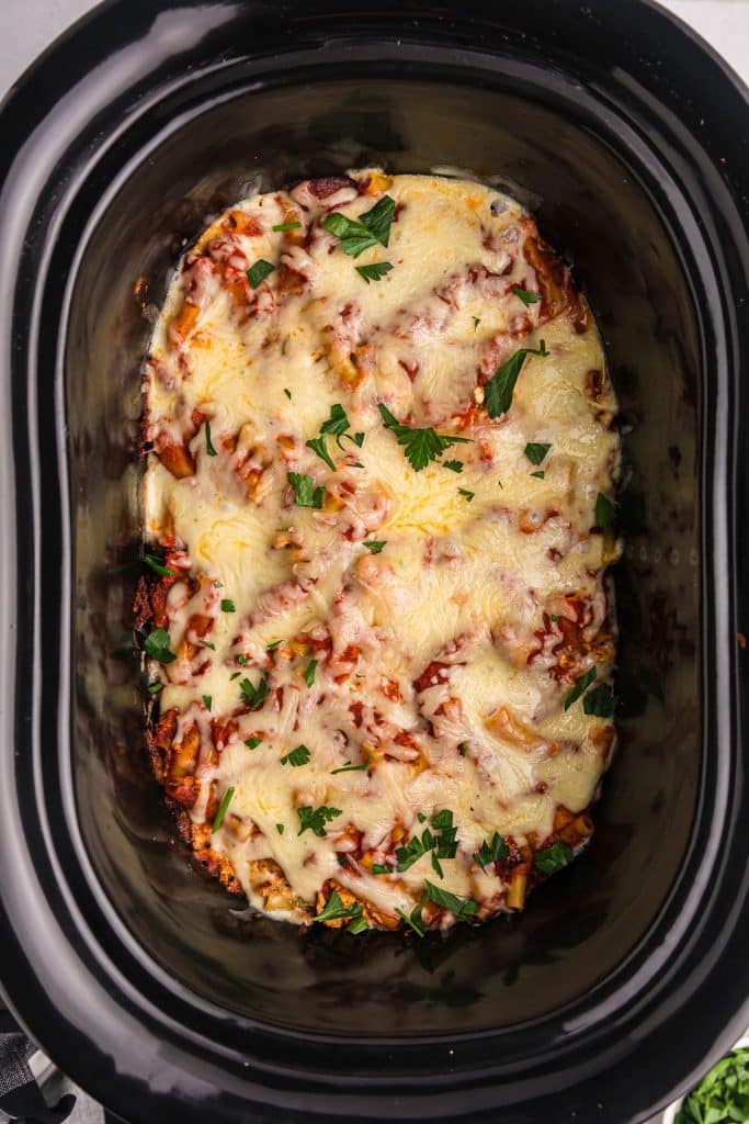 overhead shot of baked ziti in a slow cooker.