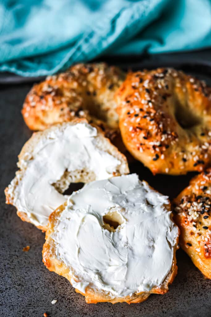 sliced bagel with cream cheese.