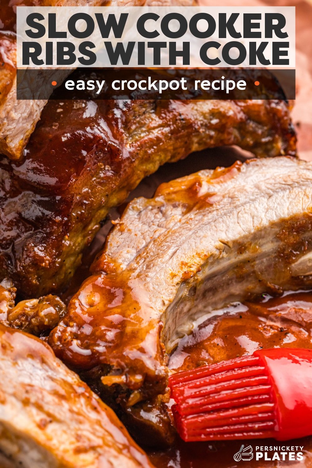 These Slow Cooker Coke Ribs are sweet, tangy, tender, and so good you won't even care how much sauce is on your face. Juicy, saucy, fall-off-the-bone ribs are made with a not-so-secret ingredient (it's in the title!) and the slow cooker does all the work! | www.persnicketyplates.com
