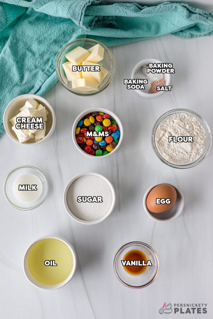overhead shot of labeled ingredients laid out to make M&M sugar cookies.