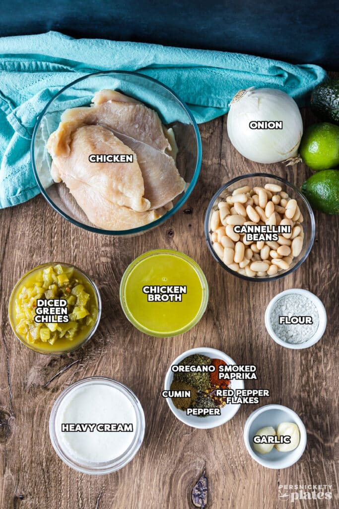 overhead shot of labeled ingredients laid out to make white chicken chili.