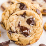 Close-up of chocolate chip cookie with melted chocolate and sea salt.